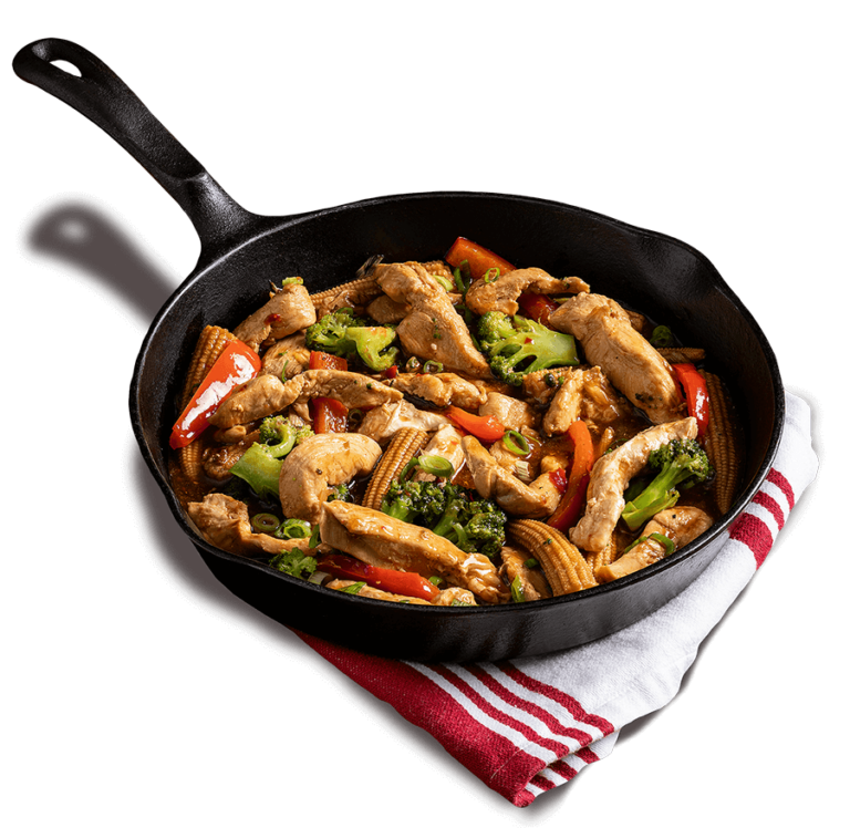 Time Savers product, Fajita Style Cut. Pictured in a stir fry in a cast iron frying pan.